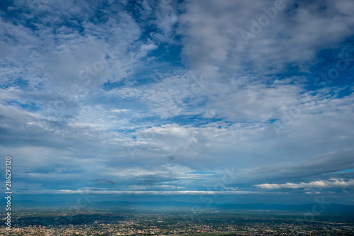 The view from the balcony to see the city and the cloudy sky in the evening or morning and with some part of clouds in the rainy season.