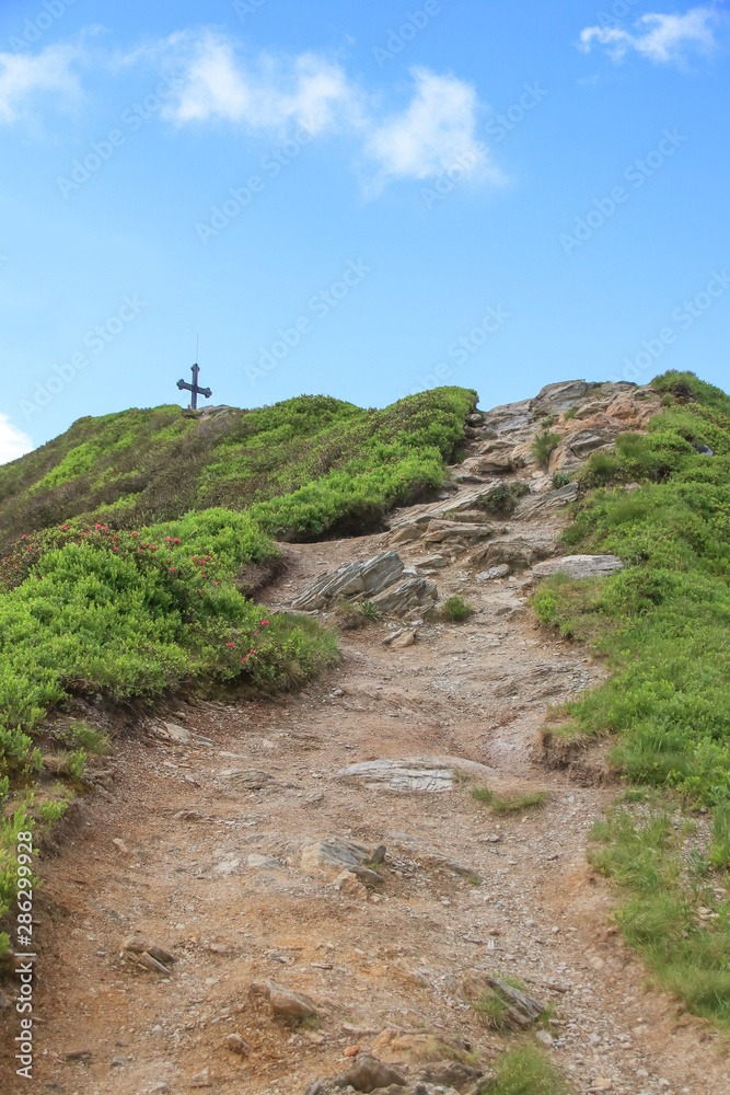 Hiking Trail to the summit cross on the Wiedersbergerhorn mountain, Tyrol - Austria