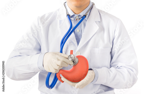 doctor use stethoscope check organ stomach , concept gastric ulcer 