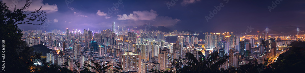 Panorama view of Hong Kong City at twilight time.