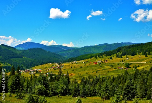 landscape with a mountain village in Bucovina - Romania