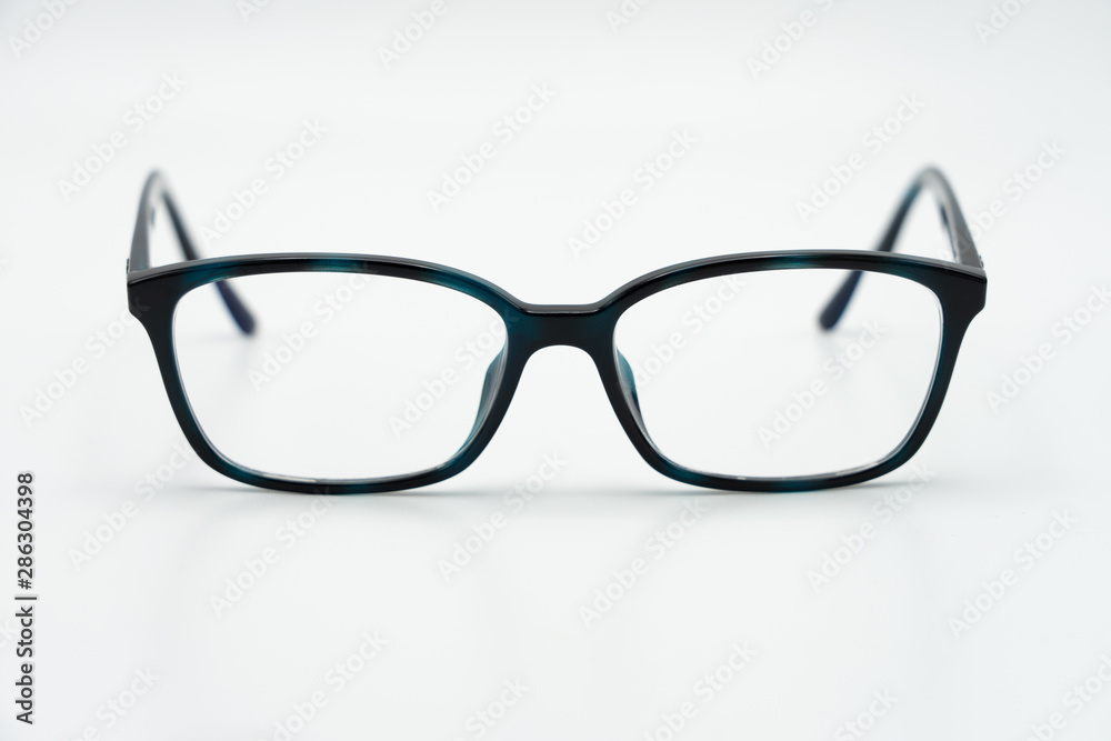 Black eye glasses spectacles with shiny black frame For reading daily life To a person with visual impairment. White background as background health concept with copy space. Black eye glasses spectacles with shiny black frame For reading daily life To a person with visual impairment. White background as background health concept with copy space.