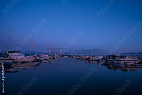 Beautiful sunset colours over harbour of Molde