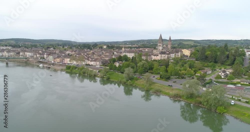 Tournus, France, wide approach over Saône river photo