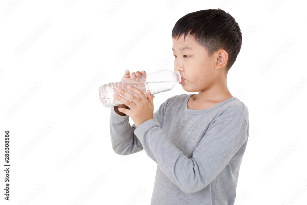 Asian Boy Drinking water Isolated on white background. Side view. Asian Boy Drinking water Isolated on white background. Side view.