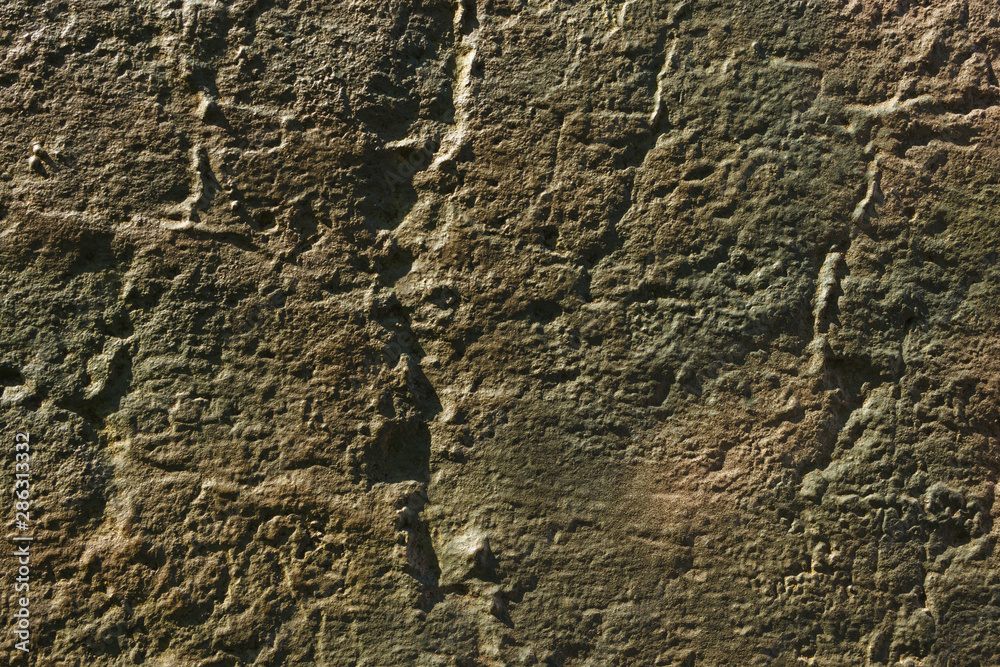 Military metal background. Old military relief texture of the tank green color Military metal background. Old military relief texture of the tank green color