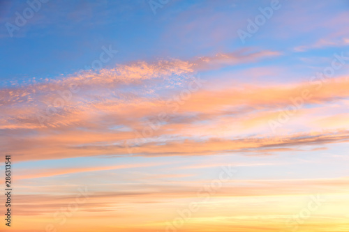 Gentle colors of Sunrise sundown sky with  soft clouds © Taiga