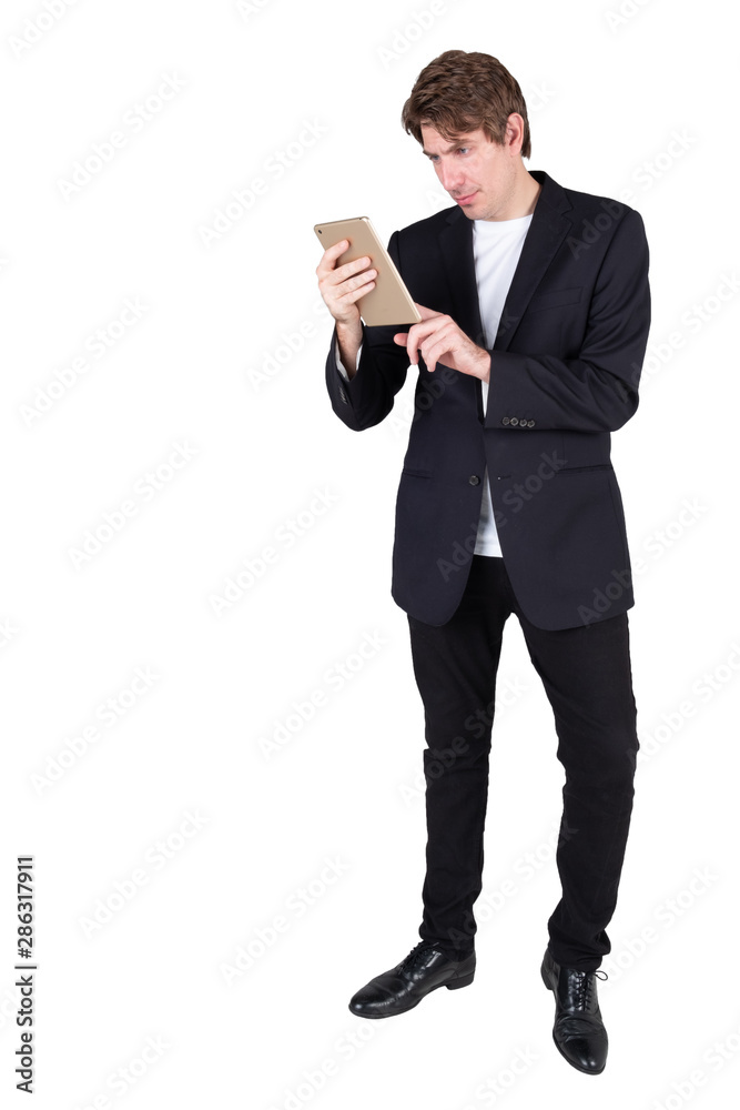 Portrait of handsome young businessman standing holding using tablet and checking email or shopping online, isolated on white background. Portrait of handsome young businessman standing holding using tablet and checking email or shopping online, isolated on white background.