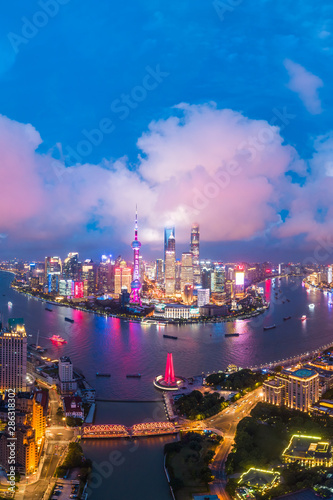 Wall Mural Aerial panoramic view of Shanghai skyline at night,China.