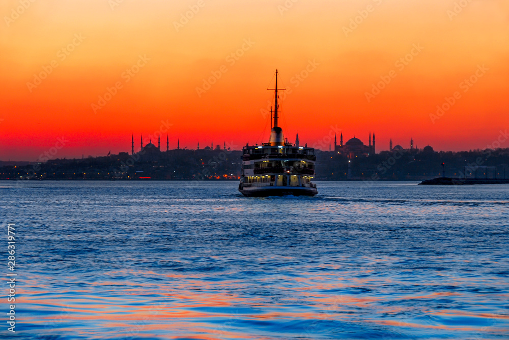 Istanbul, Turkey, 24 April 2009: City Lines, Ship, Sunset at Kadikoy