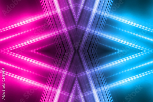 Dark abstract futuristic background. Neon lines  glow. Neon lines  shapes. Pink and blue glow