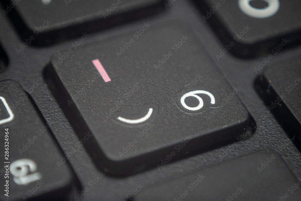 Close up of the number 9 key on a keyboard Close up of the number 9 key on a keyboard