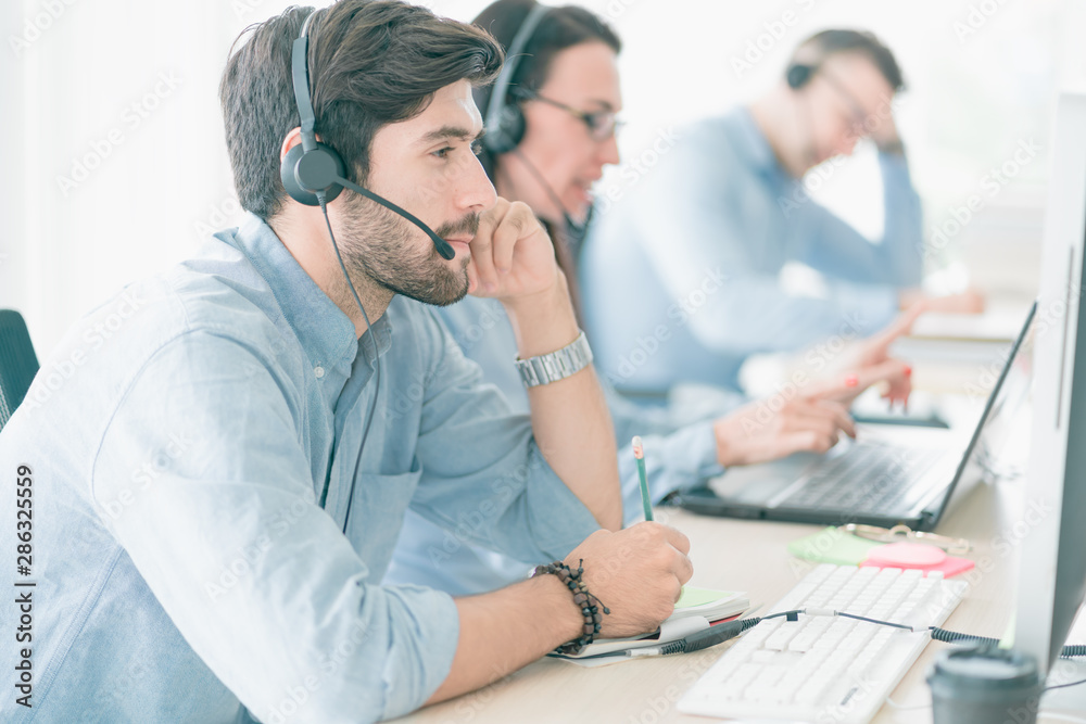 Team Business Operator in Office. Service Business, Call Center Team with Headset. The Center Appealed to Consumers to Help Identify Action Recovery Disaster. Team Business Operator in Office. Service Business, Call Center Team with Headset. The Center Appealed to Consumers to Help Identify Action Recovery Disaster.