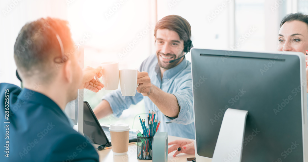 Obraz premium Team Business Operator in Office. Service Business, Call Center Team with Headset. The Center Appealed to Consumers to Help Identify Action Recovery Disaster. 
