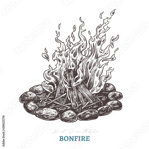 Hand drawn camping bonfire. Isolated vector illustration of fire in sketch engraving style