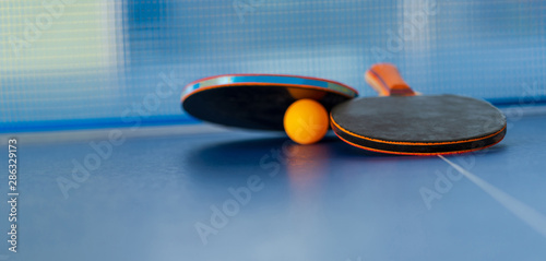 Table tennis racket and ball, Indoor sport activity © Naypong Studio