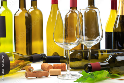 set of empty bottles of wine and glass  background  - Image