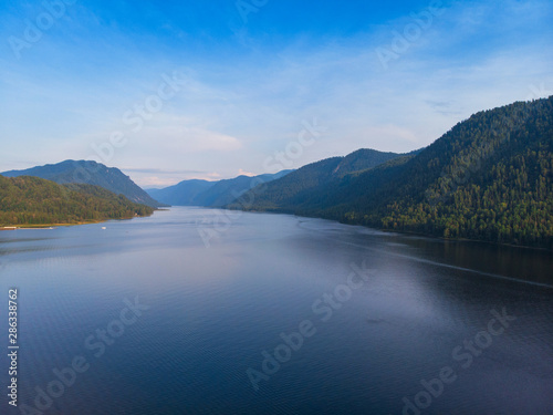 Aerial view on Teletskoye lake in Altai mountains, Siberia, Russia. Drone shot. Beauty summer day.