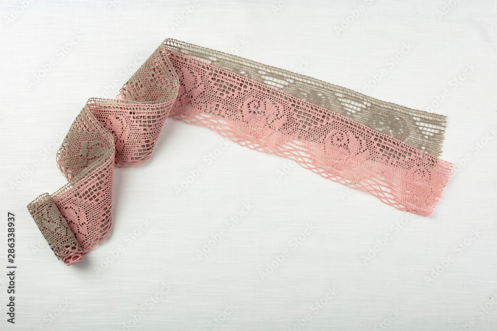 Lace on natural linen fabric. Lace on natural linen fabric.