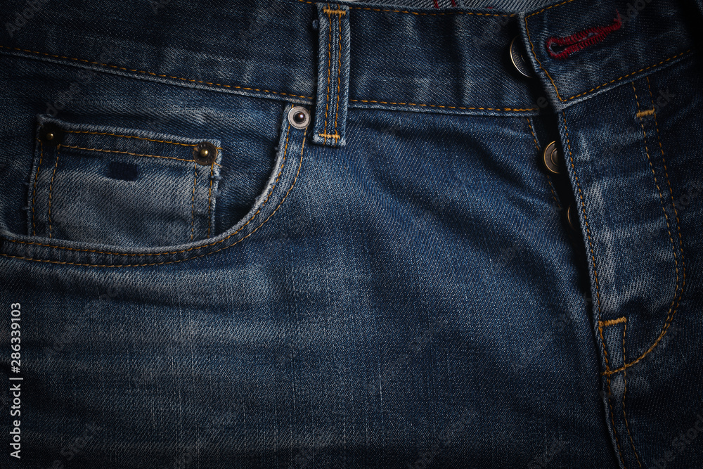 Blue Denim Jeans Pocket Design Details with Rivets and Seams Close Up View Blue Denim Jeans Pocket Design Details with Rivets and Seams Close Up View