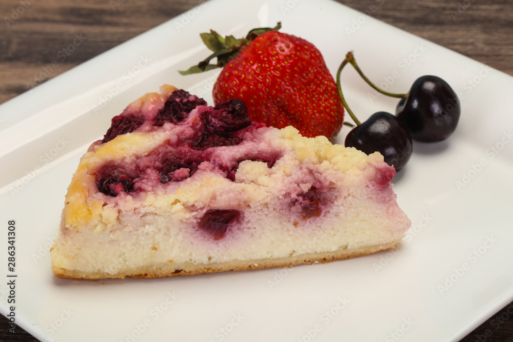 Cheesecake with cherry served strawberry Cheesecake with cherry served strawberry