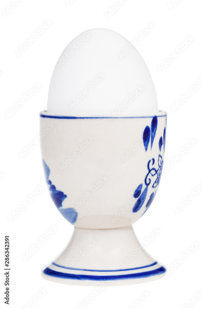 white boiled egg in cup with a pointy end up white boiled egg in cup with a pointy end up