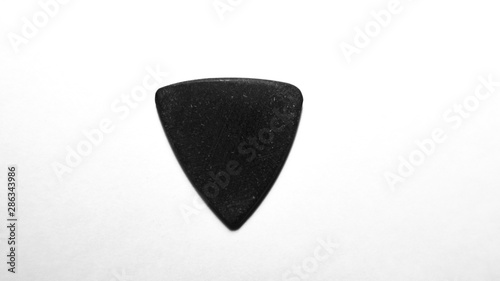 guitar pick . color background . closeup photo