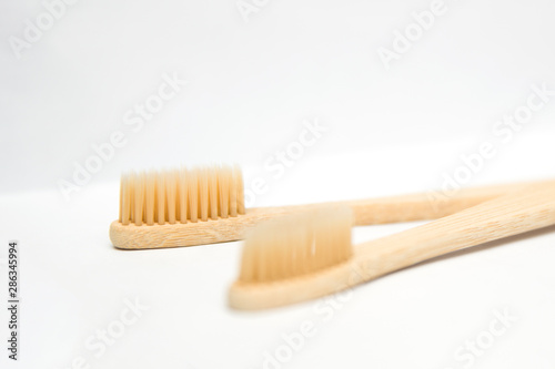 Bamboo toothbrushes isolated on the white background