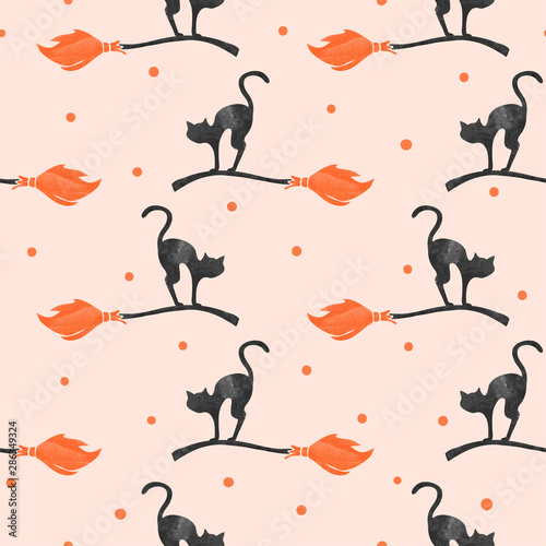 Seamless Halloween pattern with black cat and witch broom.