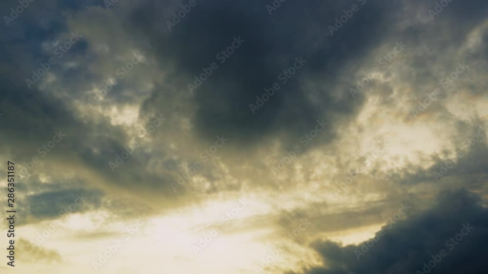 The blue sky has a beautiful white cloud mass with a copy of space, the clouds float across the sky in a period of time The blue sky has a beautiful white cloud mass with a copy of space, the clouds float across the sky in a period of time