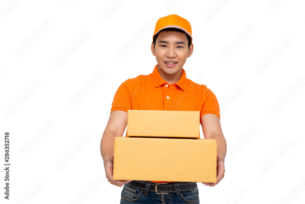 Happy young Asian delivery man in orange cap standing with parcel post box isolated over white background Happy young Asian delivery man in orange cap standing with parcel post box isolated over white background