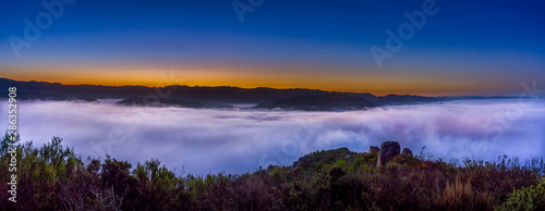 sunset over the Sea of Clouds in Valley panorama