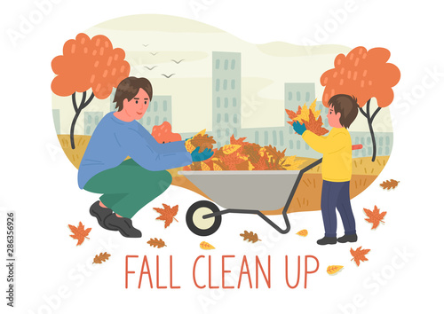 Fall Clean Up. Father and sun cleaning up autumn leaves.