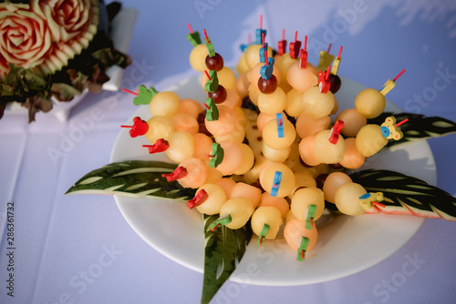 Tropical fruits assortment on a plate. Thai fruit, combination dish of Thai fruit papaya, watermelon and pineapple.The Dragon Fruits ( Hylocercus undatus (Haw) Brit. & Rose.) photo