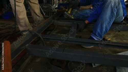 HD : Worker welding in factory