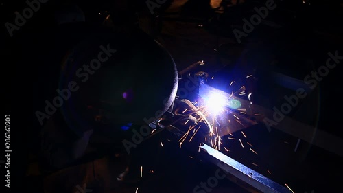 HD : Worker welding in factory
