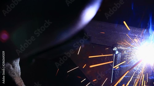 HD : Worker welding in factory