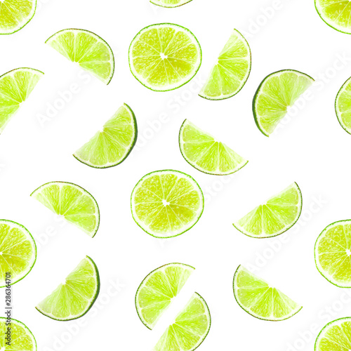 Seamless pattern of Juicy green lime slices and haft citrus isolated on white background. Healthy food concept
