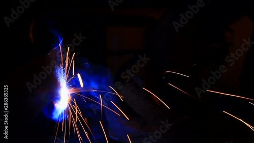 HD : Worker welding in factory