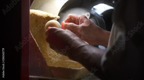 Dental Technician working on dentures photo