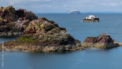 Sun shinging on the rocks, Dunbar photo