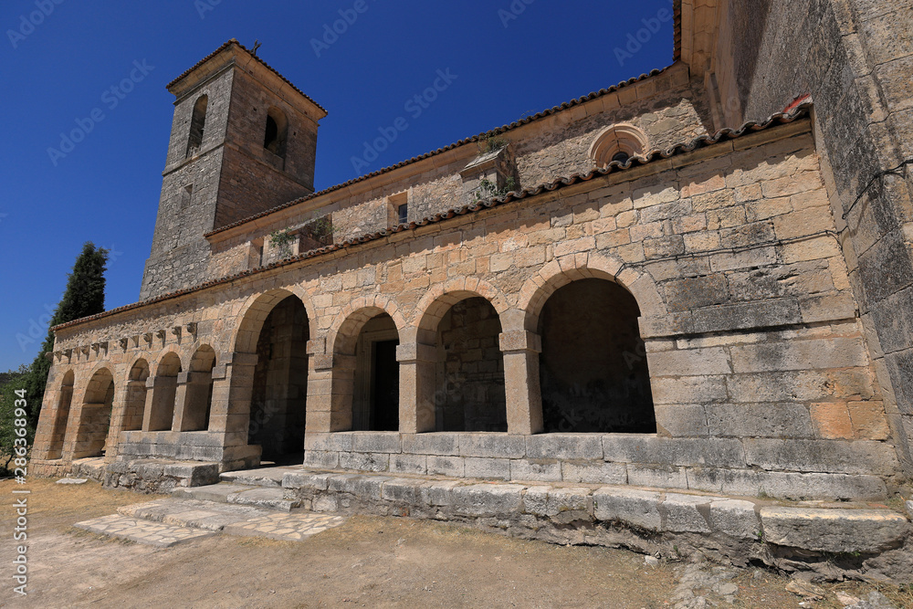 Cloister, arches and columns of a Romanesque church in Tamajón, Guadalajara (Spain)