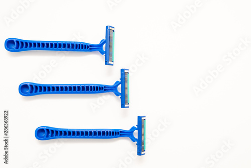 New disposable razor blade, on white background, isolated