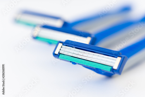 New disposable razor blade, on white background, isolated