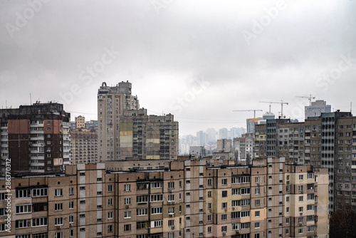 City jungle. Photo of a city with tall buildings. Visible fog in the distance