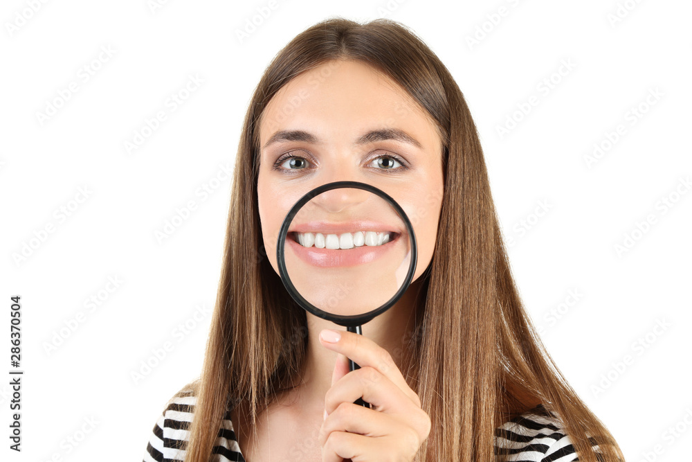 Young woman with magnifying glass on white background Young woman with magnifying glass on white background