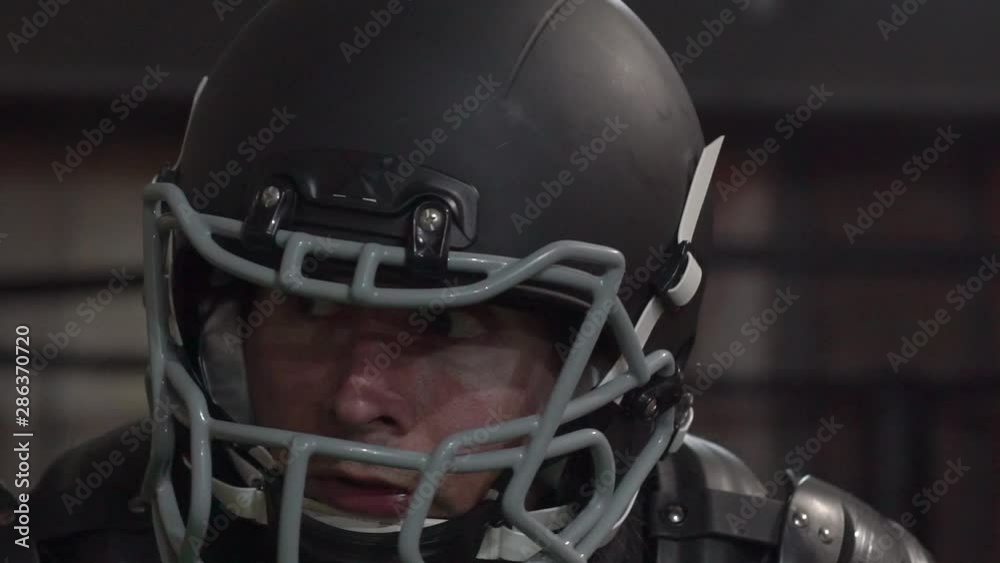 A young man trains and plays American football, throws and catches the ball A young man trains and plays American football, throws and catches the ball