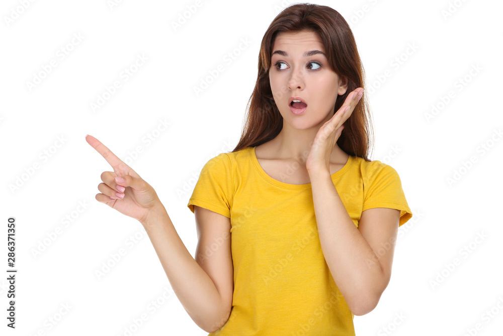 Young woman in yellow t-shirt on white background Young woman in yellow t-shirt on white background