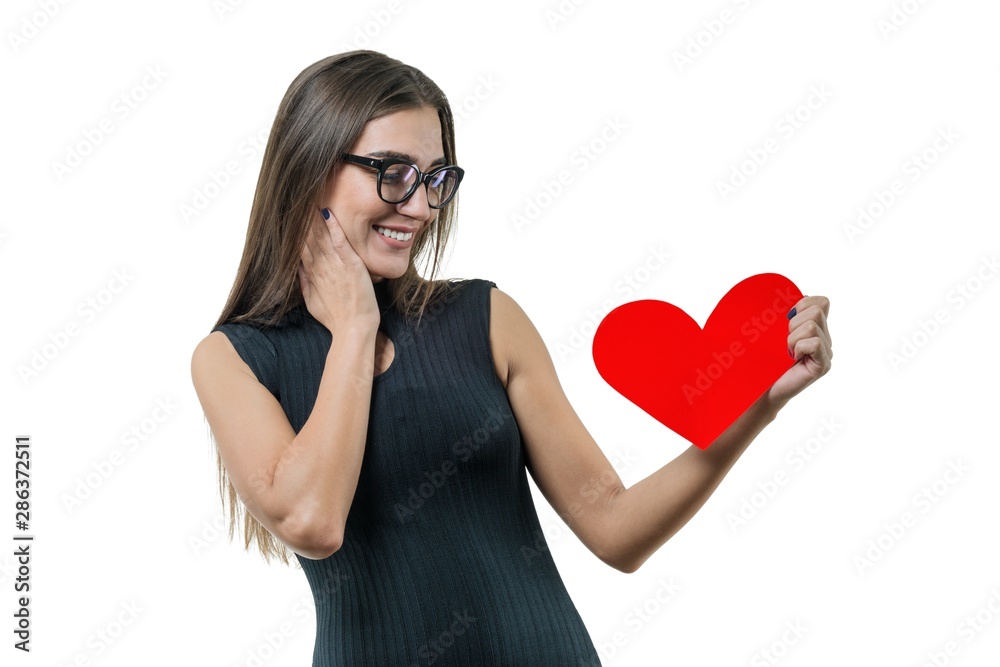 Isolated portrait of young woman with paper red heart Isolated portrait of young woman with paper red heart