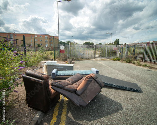 Fly tipping in urban street, West Midlands, UK